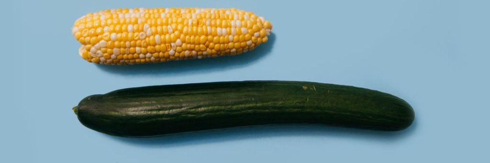 Bild eines Maiskolben und einer Zucchini